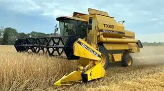 New Holland TX68 Opinie